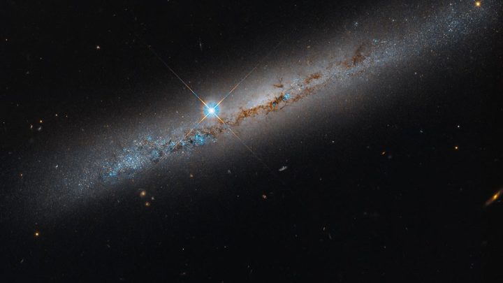 NASA’s Hubble Spies Spiral’s Edge